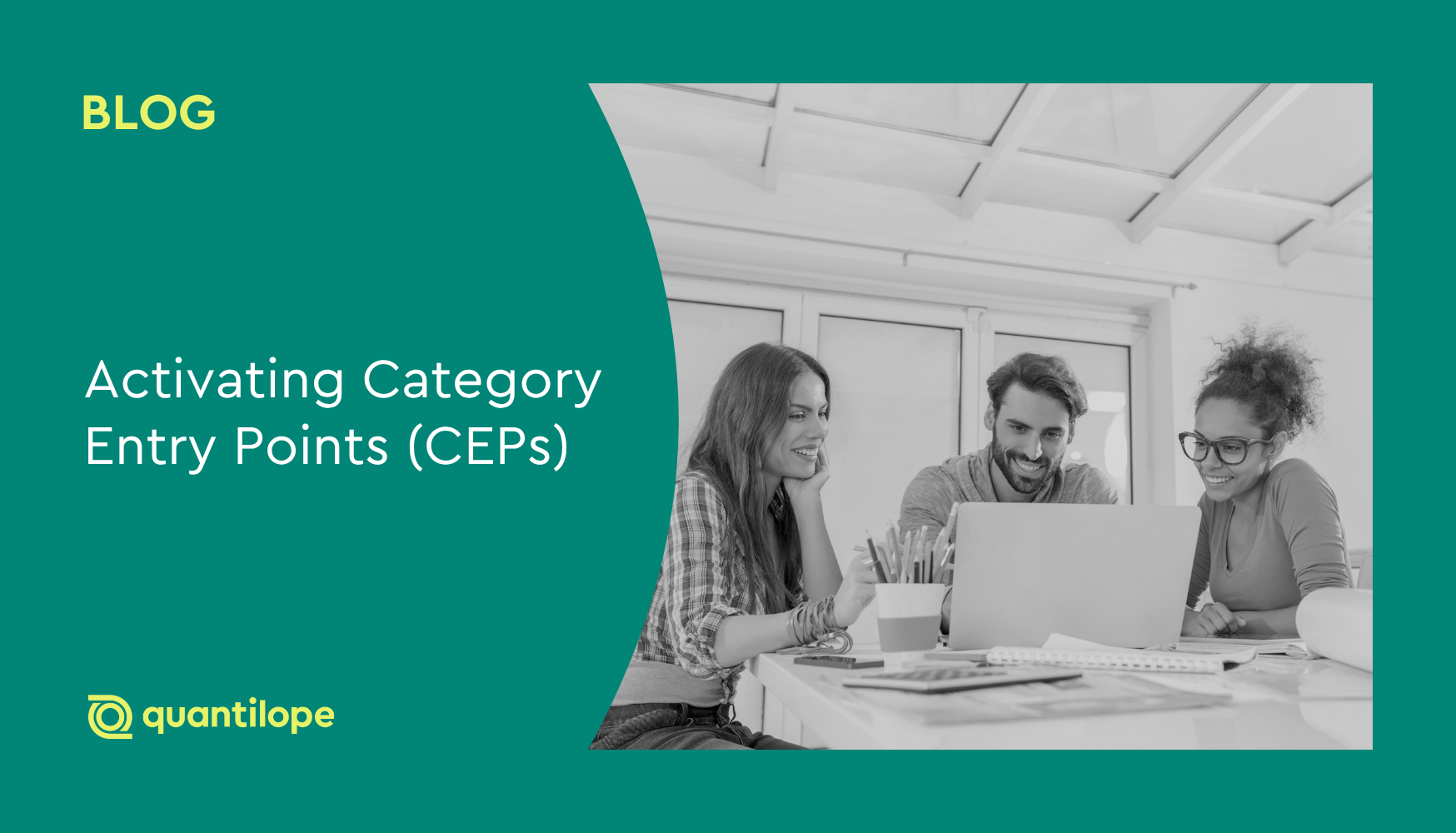 green blog background with black and white image of people smiling at laptop screen