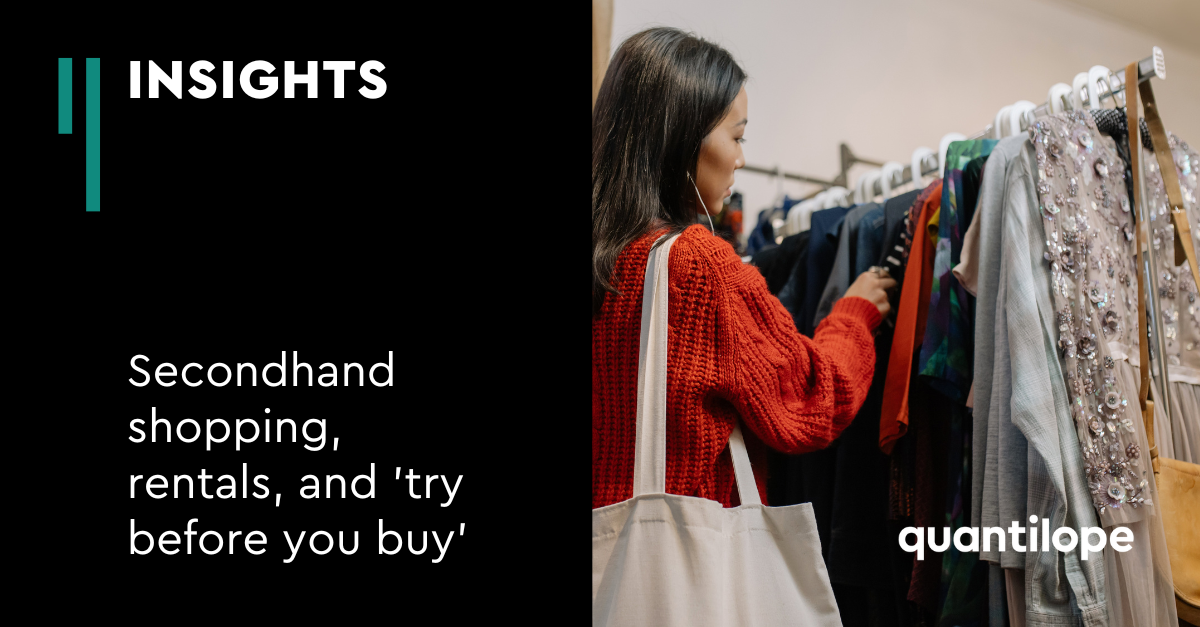 woman shopping for clothing on rack